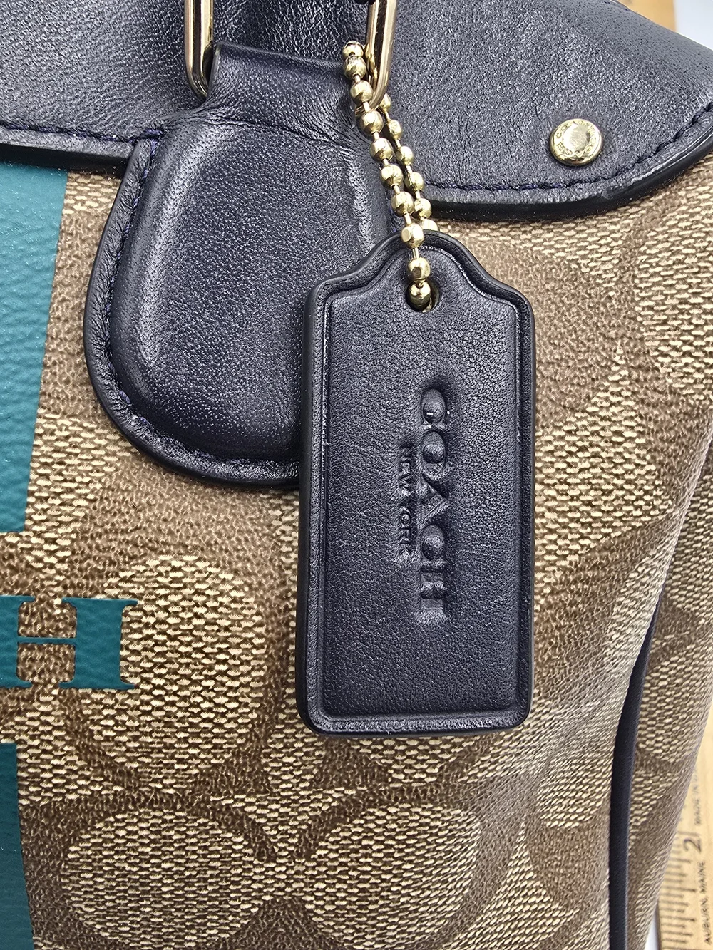 Coach satchel featuring